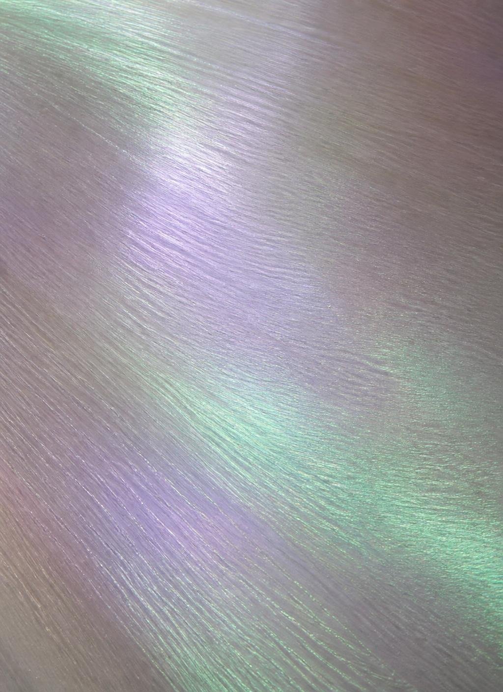 Soft iridescent material in violet and green tones